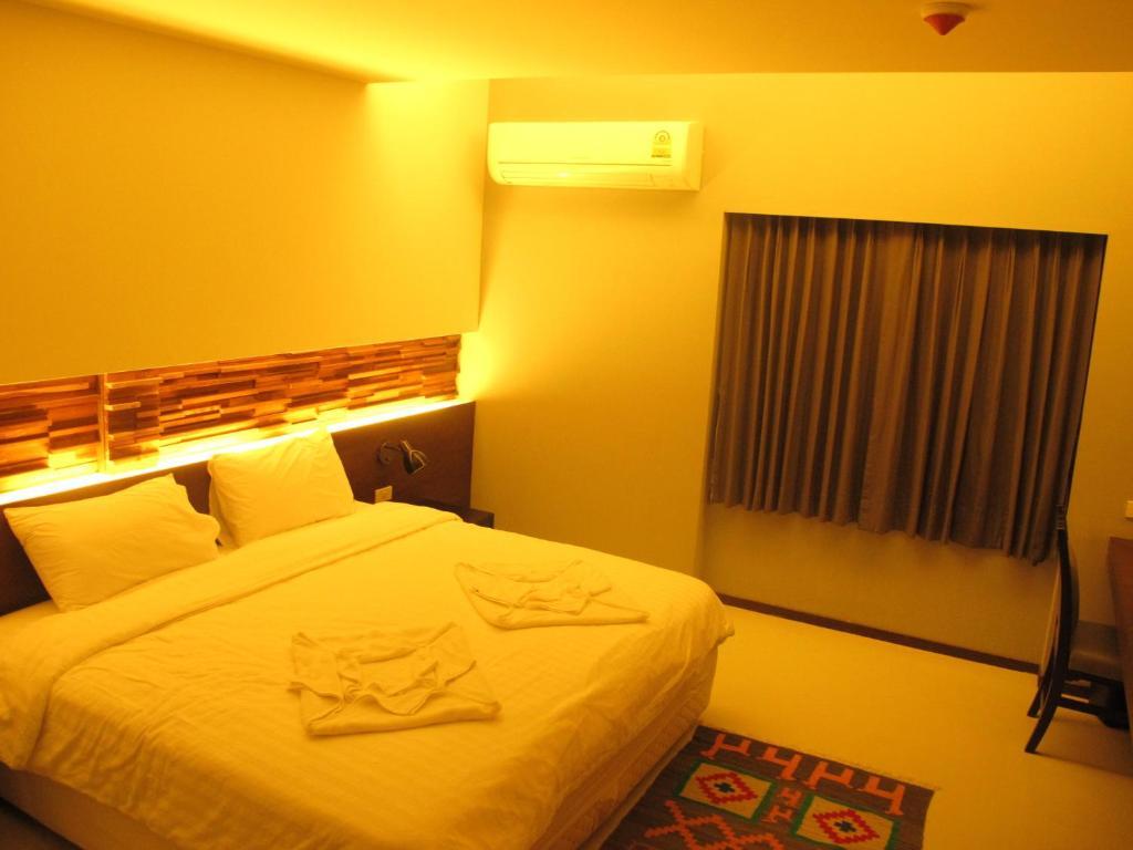 At One Inn Hualampong Бангкок Номер фото